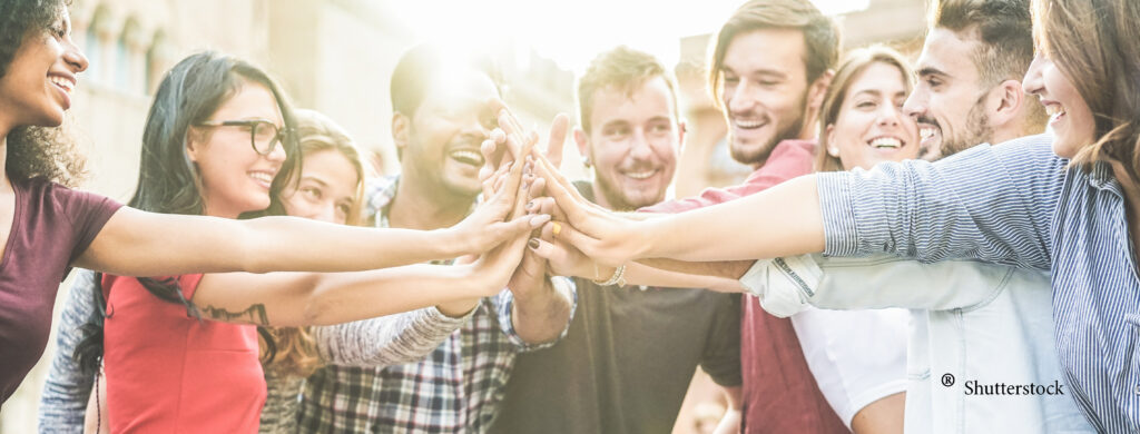 group of people holding hands